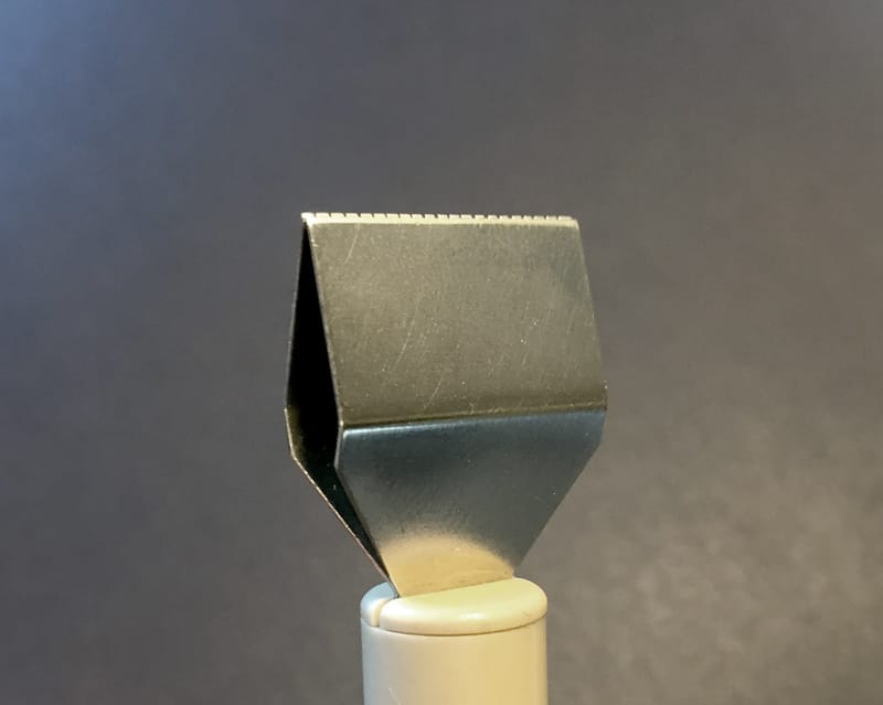 Write with the non-slotted side of the pen facing upward