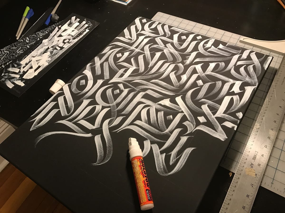 White marker composition on a black canvas