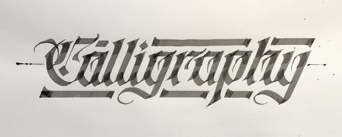 The word calligraphy written in italic blackletter