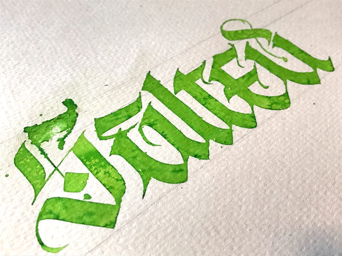 Textured watercolor calligraphy by Jake Rainis