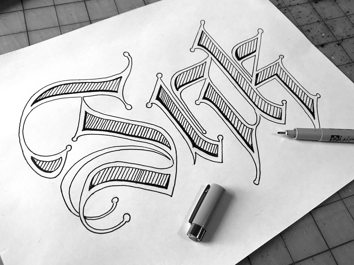 Inked hand lettering of a Calligraphy piece
