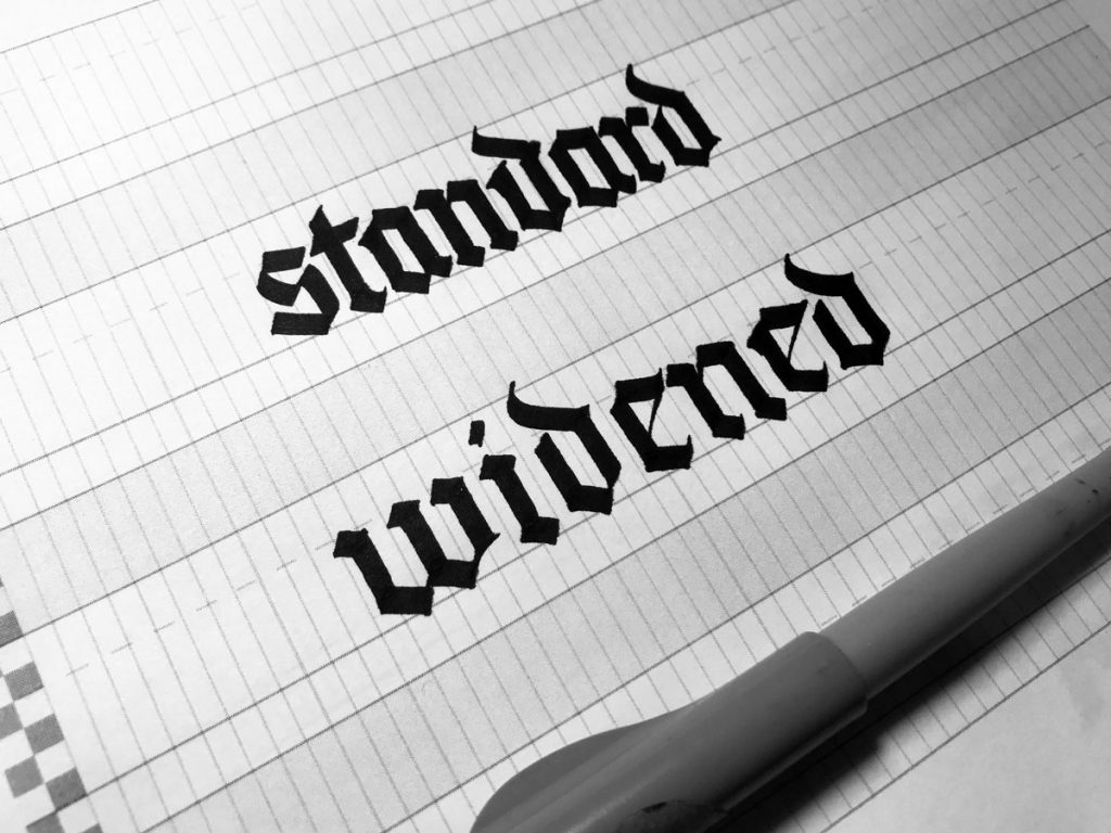 Vertical blackletter calligraphy guides can help control letter-width consistently in